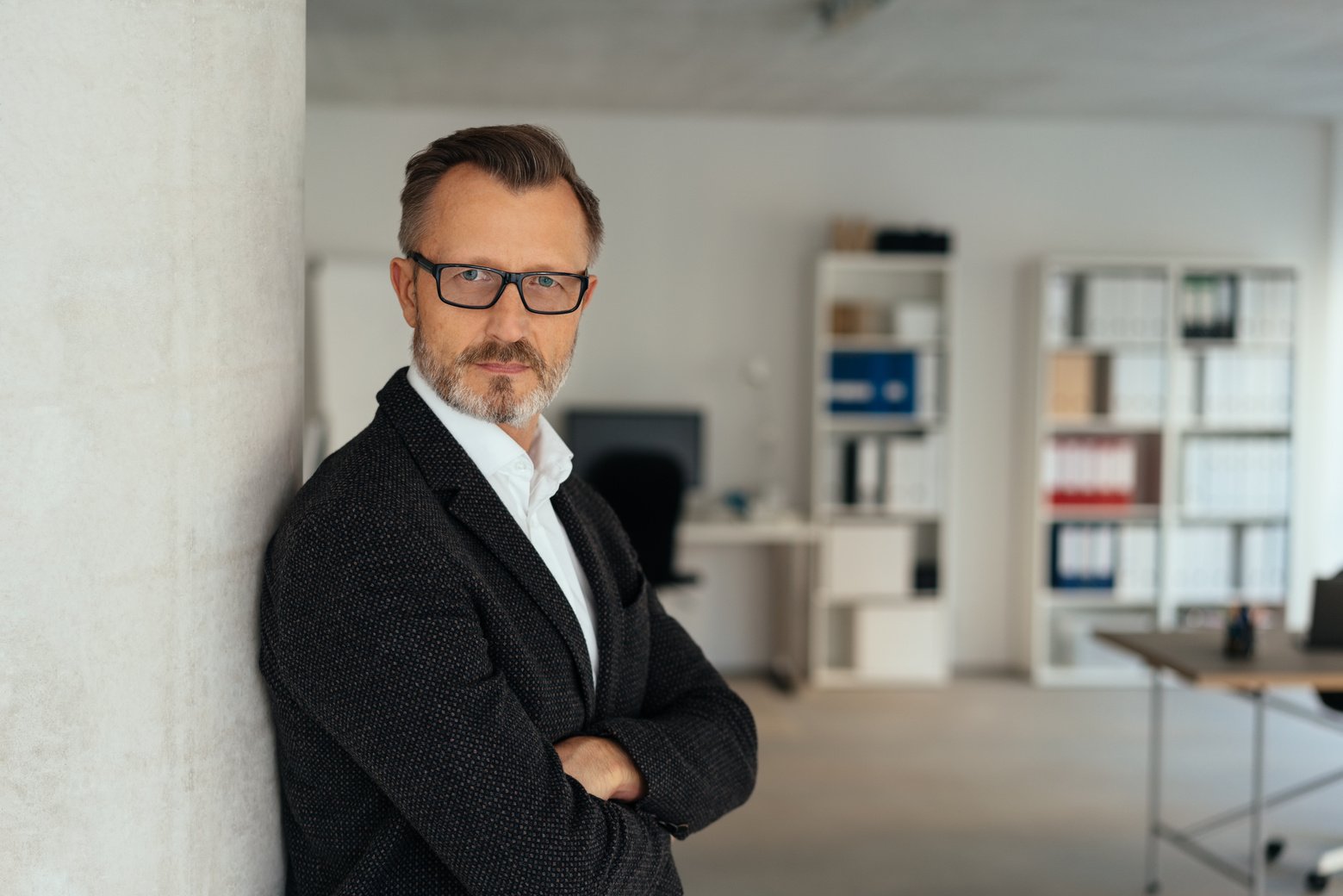 Authoritative determined businessman in office